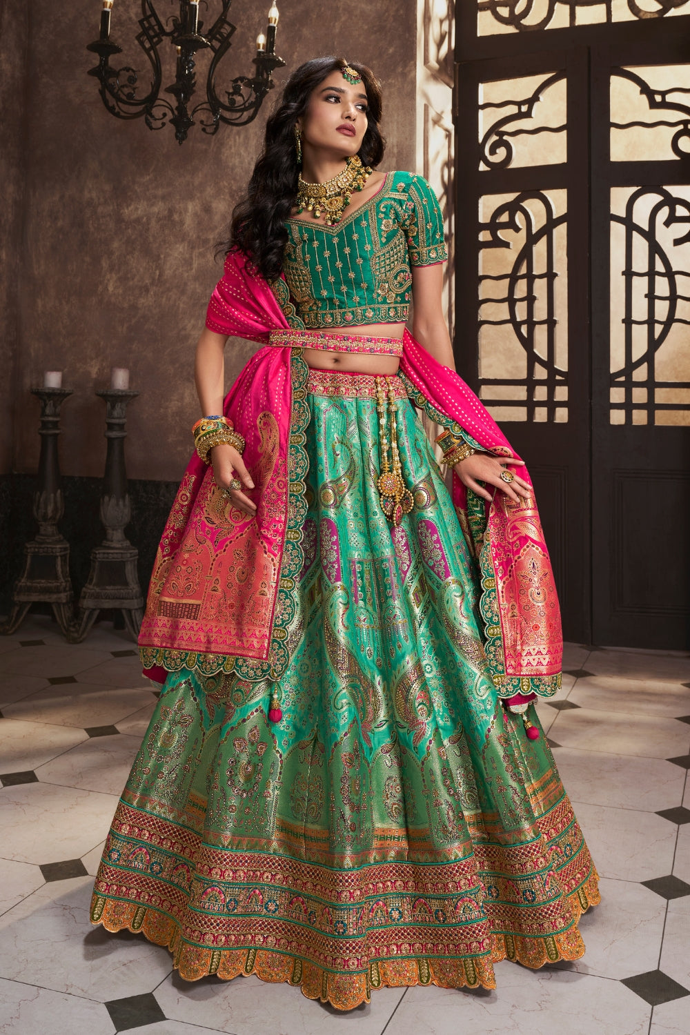 GREEN SILK WITH SEQUENCE ZARKAN WORK LEHENGA