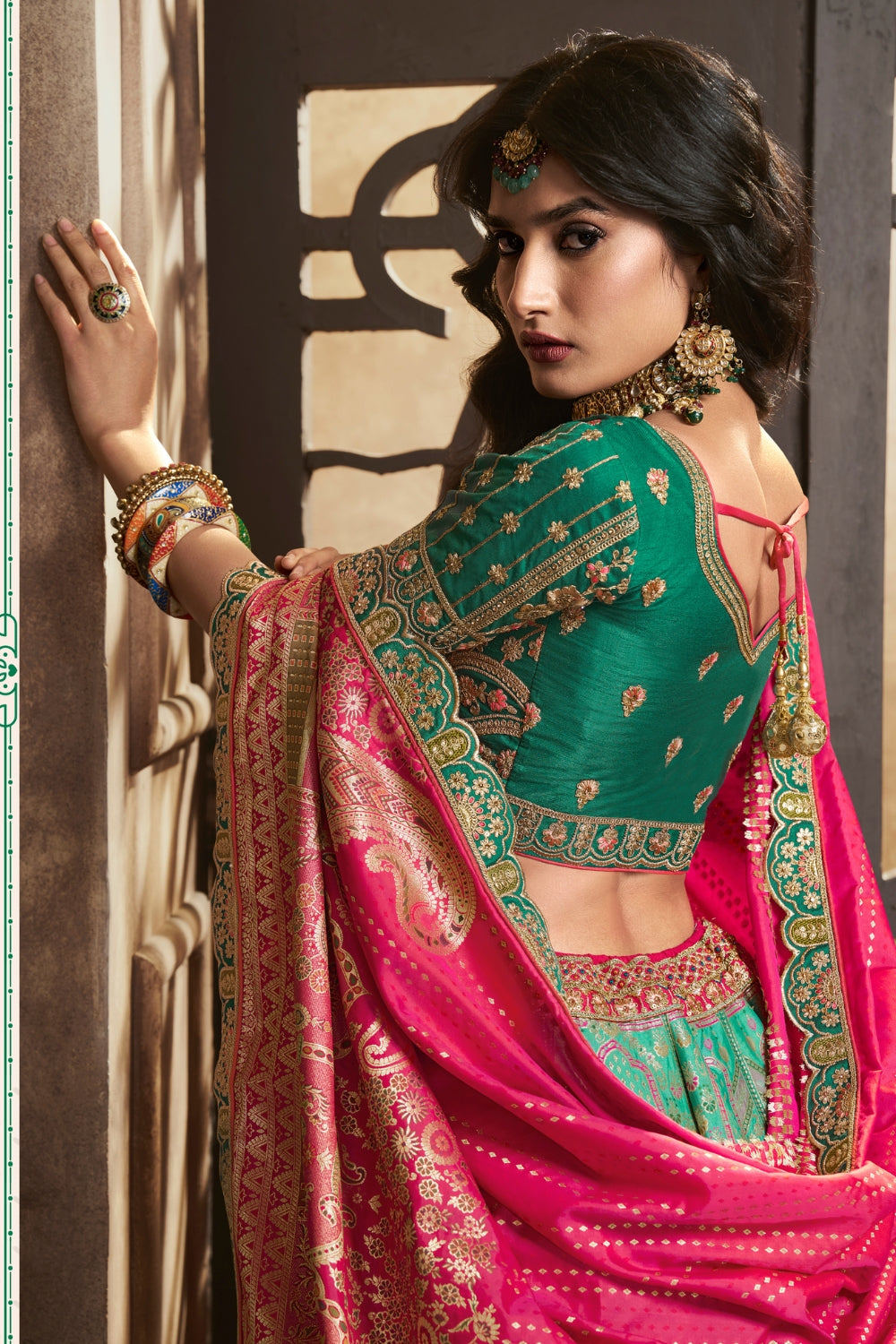 GREEN SILK WITH SEQUENCE ZARKAN WORK LEHENGA