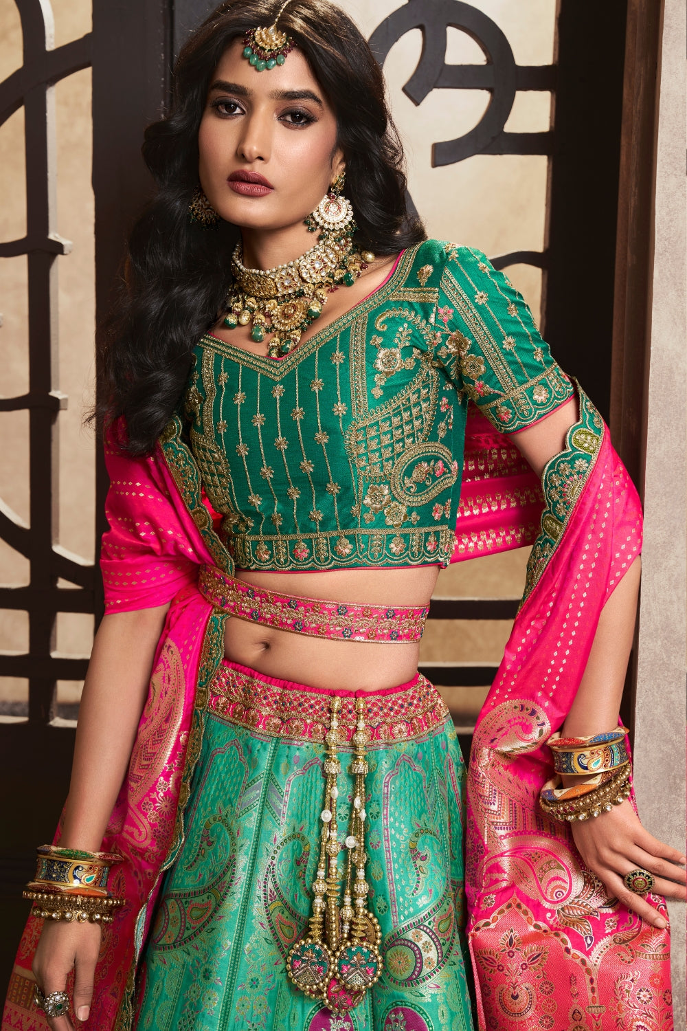 GREEN SILK WITH SEQUENCE ZARKAN WORK LEHENGA