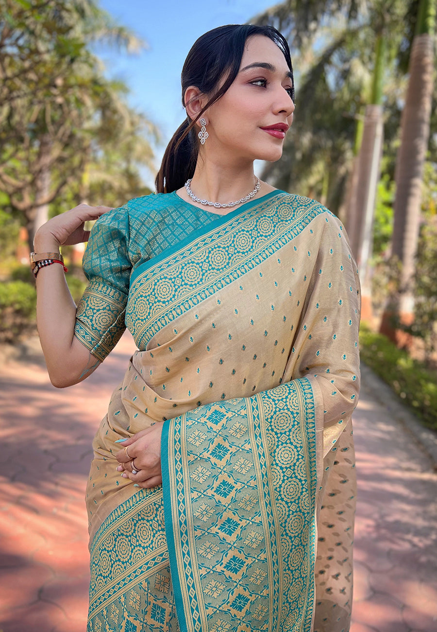 Chickoo Cream Tissue Zari Woven Saree